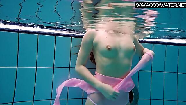 Underwater Show featuring Liza's small tits clip