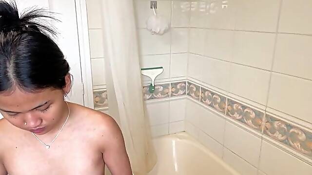 Bony japanese teenager caught in bathroom voyeur webcam