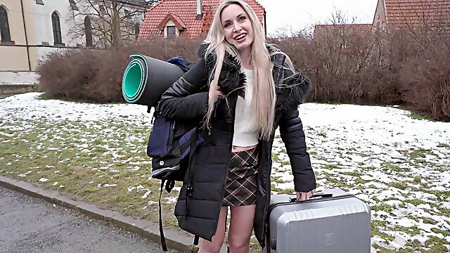 Blonde Micky Muffin is getting picked up outdoors