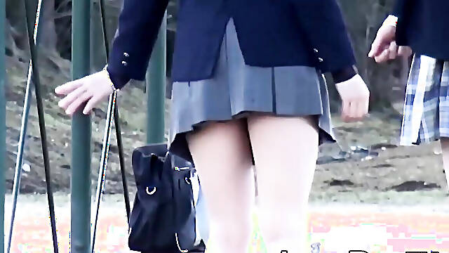 Japanese chicks in school uniform pee on the bench outside
