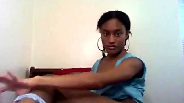 Sexy ebony girl shows her juicy pussy and perky ass
