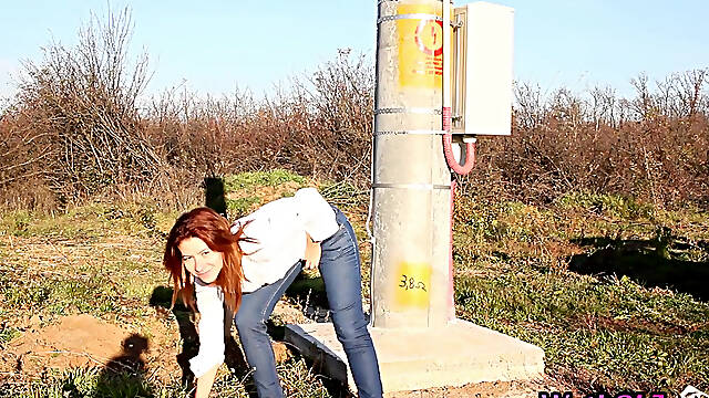 Wetting her jeans really well